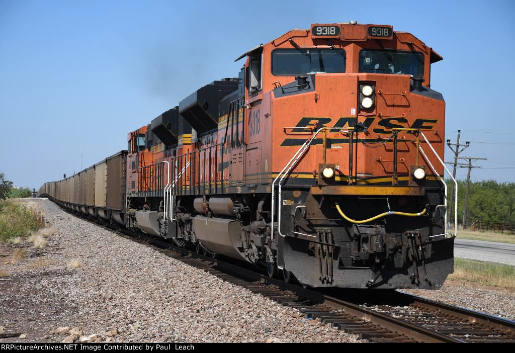 Loaded coal train rolls east
